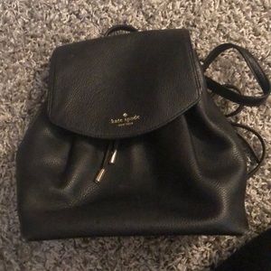 Black Kate Spade mini leather backpack.